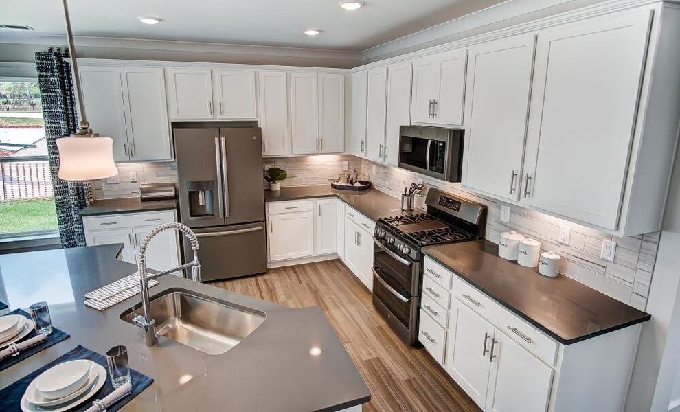 Furnished interior in a model home at Bryton Crossing Townhomes in Huntersville (Image 6). Furnished interior in a model home at Bryton Crossing Townhomes in Huntersville (Image 6).