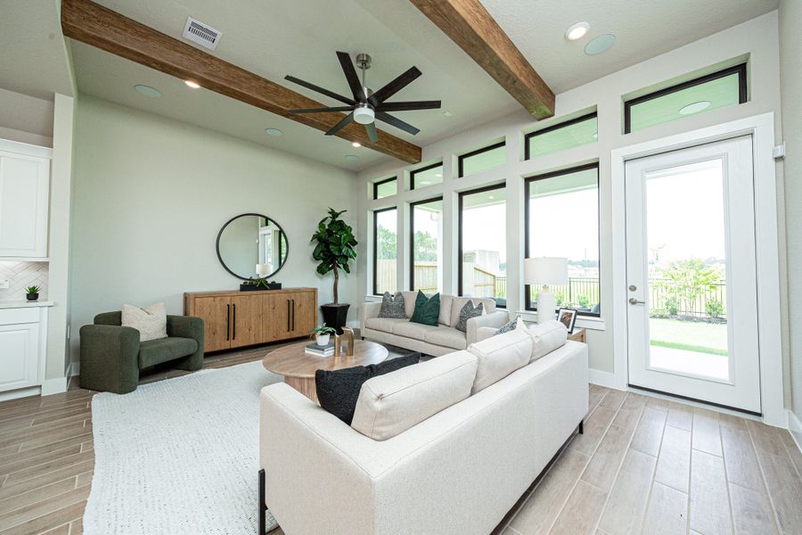 Furnished interior in a model home at Meridiana in Manvel (Image 18).