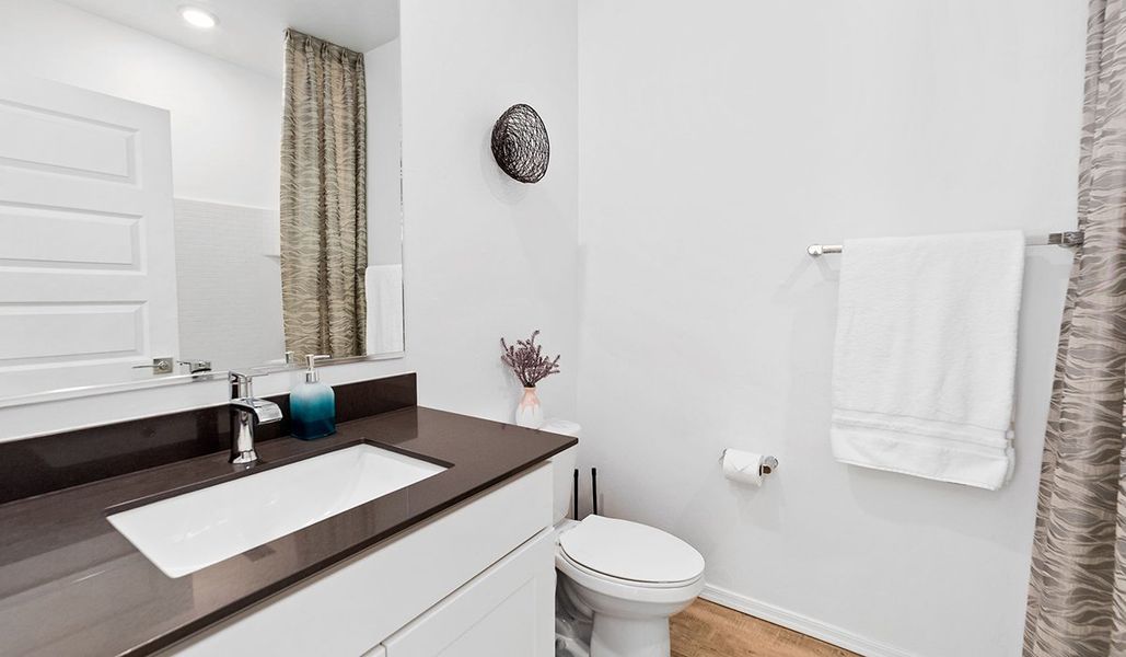 Furnished interior in a model home at Barnett Village in Marana (Image 29).