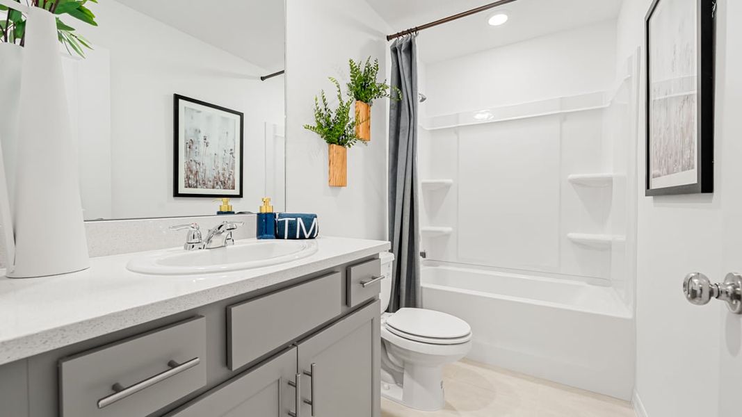 Furnished interior in a model home at The Towns at Tiburon in Nokomis (Image 40).