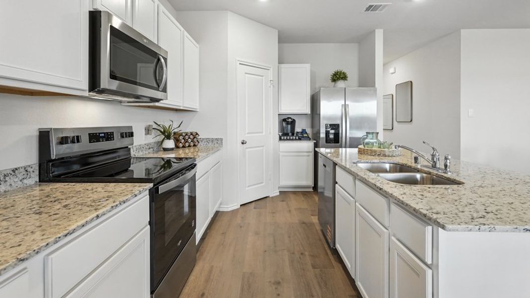 Furnished interior in a model home at Saddlebrook in Waxahachie (Image 11).