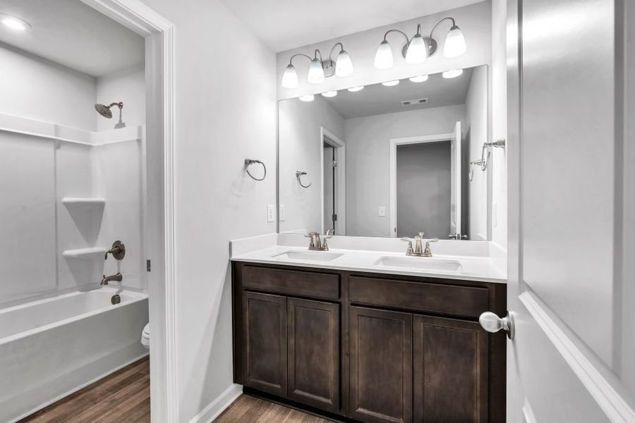 Furnished interior in a model home at The Reserve at Chapel Hill Phase II in Douglasville (Image 24).