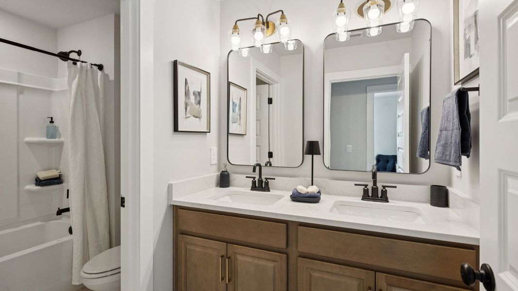 Furnished interior in a model home at Harvest Point in Spring Hill (Image 46).