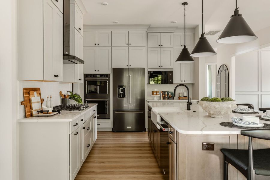 Furnished interior in a model home at Mayes Hall in Davidson (Image 44).