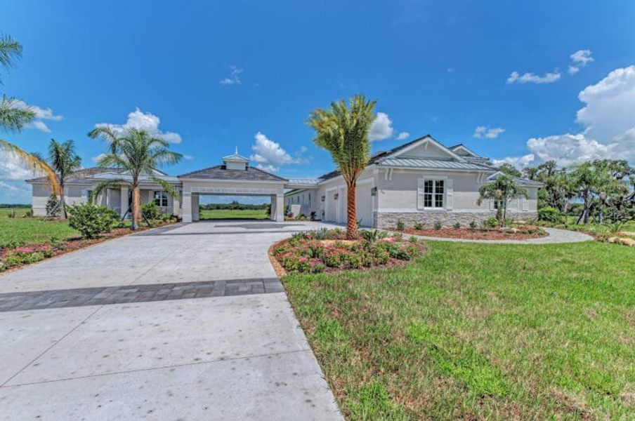 Front exterior of a home in the Hampton Lakes community, located in Sarasota, FL (Image 36). Front exterior of a home in the Hampton Lakes community, located in Sarasota, FL (Image 36).