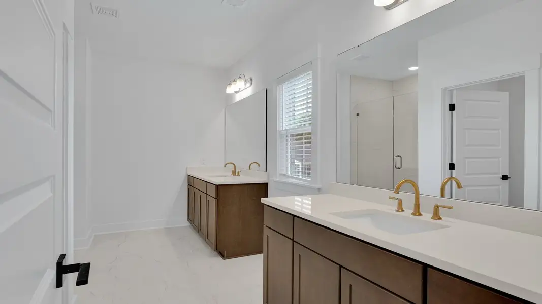 Furnished interior in a model home at Ballam Oaks in Mount Pleasant (Image 16). Furnished interior in a model home at Ballam Oaks in Mount Pleasant (Image 16).