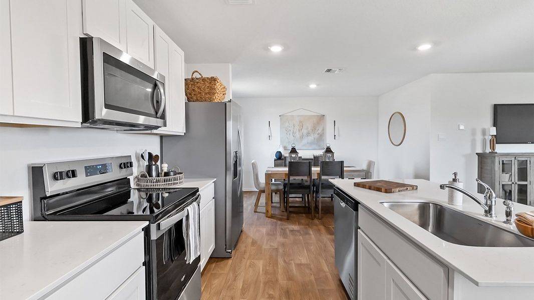 Furnished interior in a model home at Sereno Springs in Converse (Image 17).