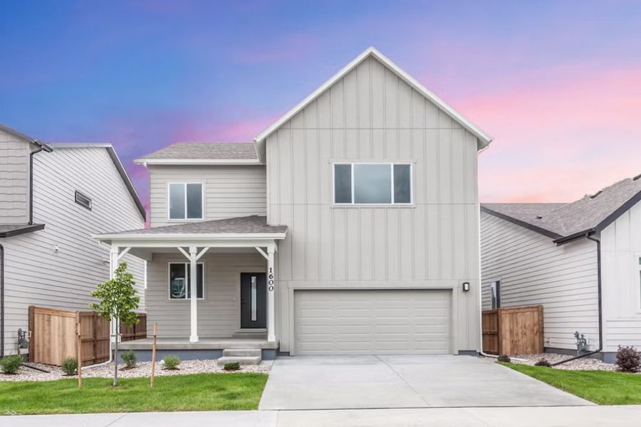 Front exterior of a home in the Granary Trailblazer Collection - Single Family Homes community, located in Johnstown, CO (Image 4). Front exterior of a home in the Granary Trailblazer Collection - Single Family Homes community, located in Johnstown, CO (Image 4).