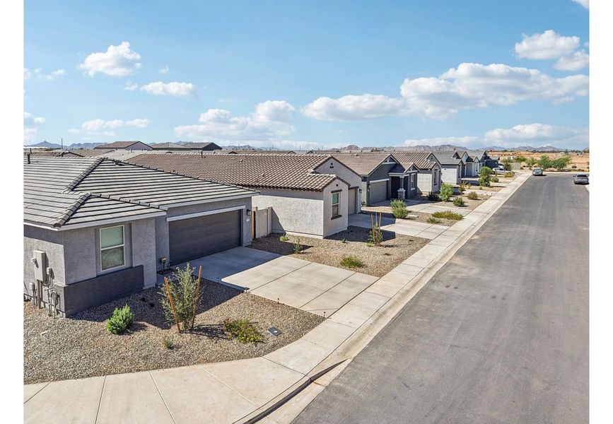 Front exterior of a home in the Amarillo Creek community, located in Maricopa, AZ (Image 13).