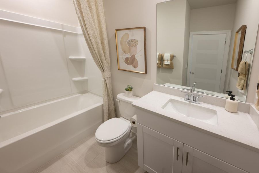 Furnished interior in a model home at Chatham Forest in Duncan (Image 14).