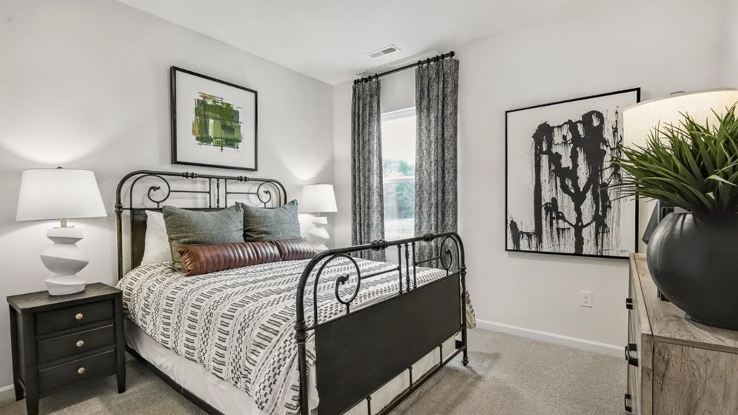 Furnished interior in a model home at Bexford in Willow Spring (Image 18).