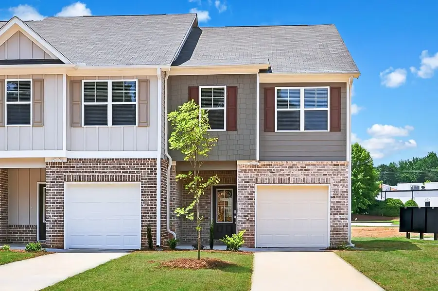 Front exterior of a home in the The Reserve at Clocktower community, located in Douglasville, GA (Image 4).