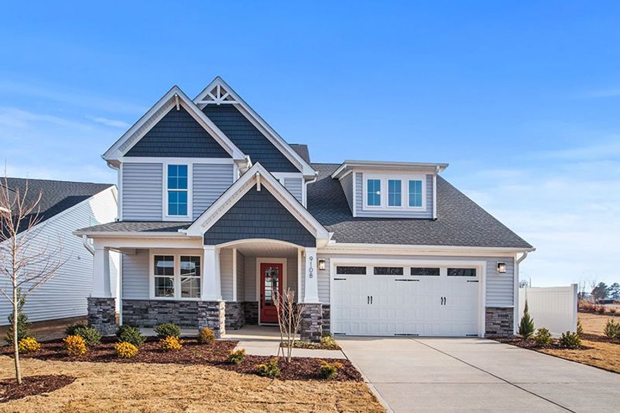 Front exterior of a home in the WyndWater community, located in Hampstead, NC (Image 14).