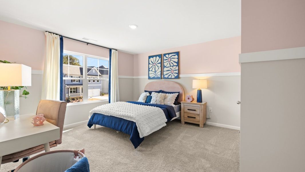 Furnished interior in a model home at Liberty Crossing in Braselton (Image 17).