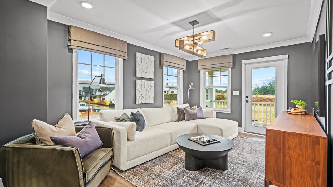 Furnished interior in a model home at Station Pointe Phase 2 in Angier (Image 31).
