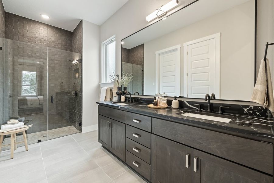 Furnished interior in a model home at Wolf Ranch in Georgetown (Image 19).