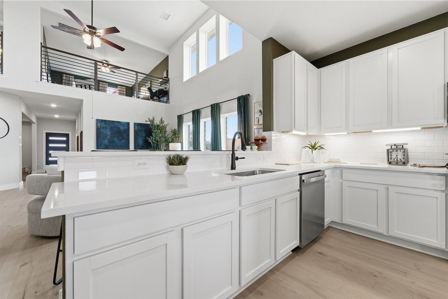 Furnished interior in a model home at Infinity Square in Kyle (Image 22).