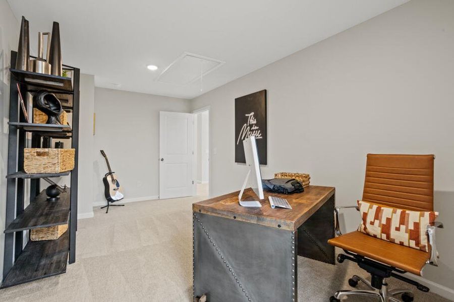 Furnished interior in a model home at East Main Townes in Spartanburg (Image 29).