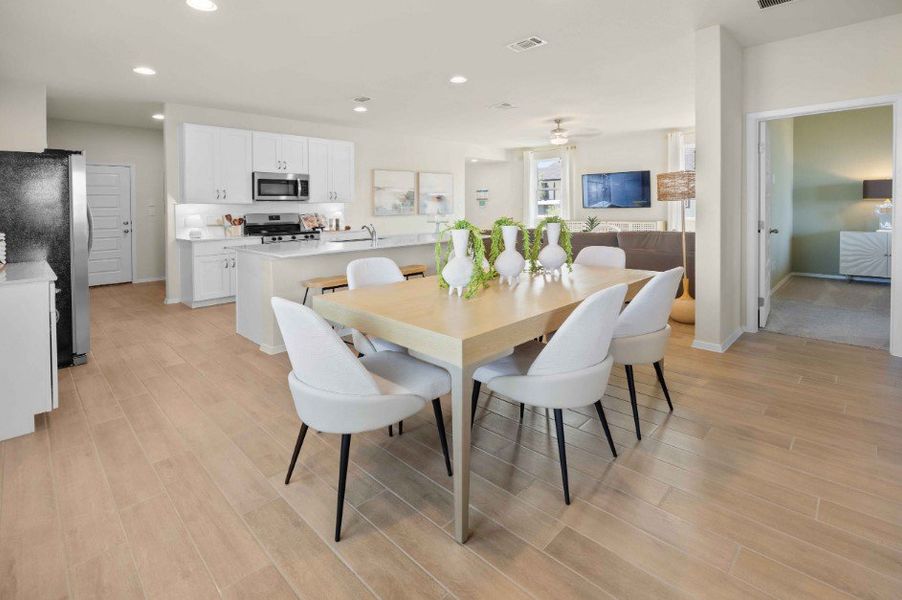 Furnished interior in a model home at Hunters Ranch in San Antonio (Image 29).