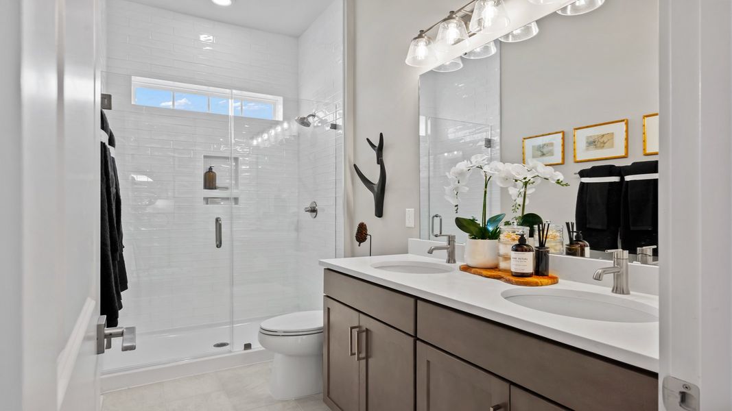 Furnished interior in a model home at Ocean Isle Palms in Shallotte (Image 19).