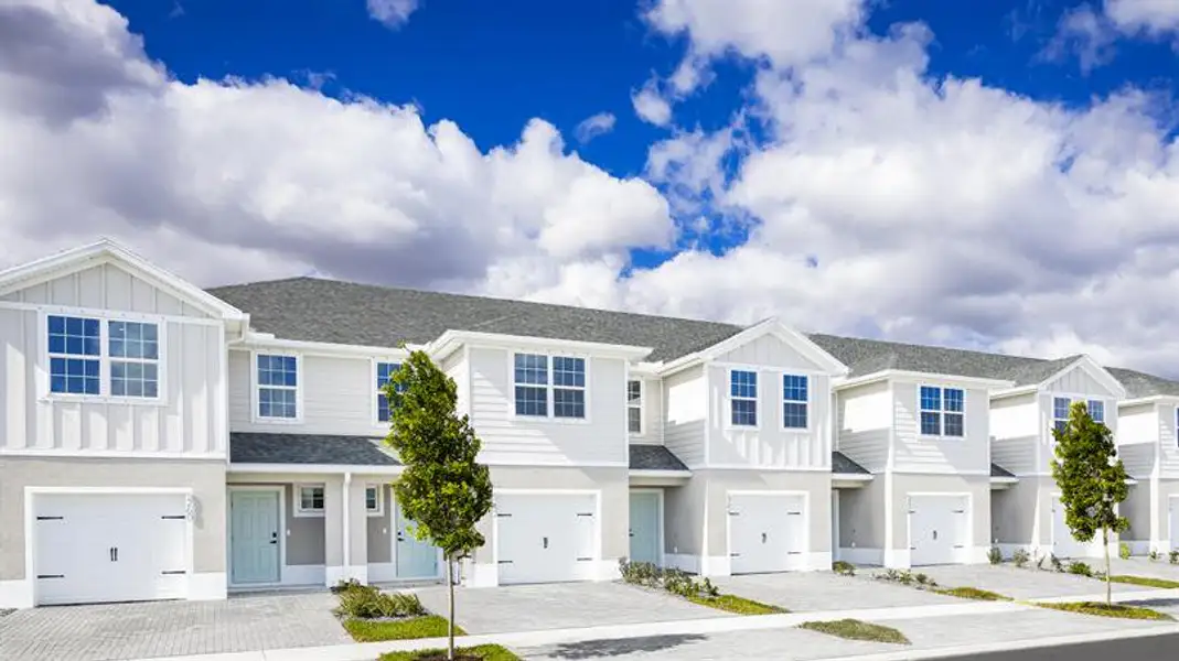 Exterior Spacious driveways and attached garage for easy two-car living and storage.