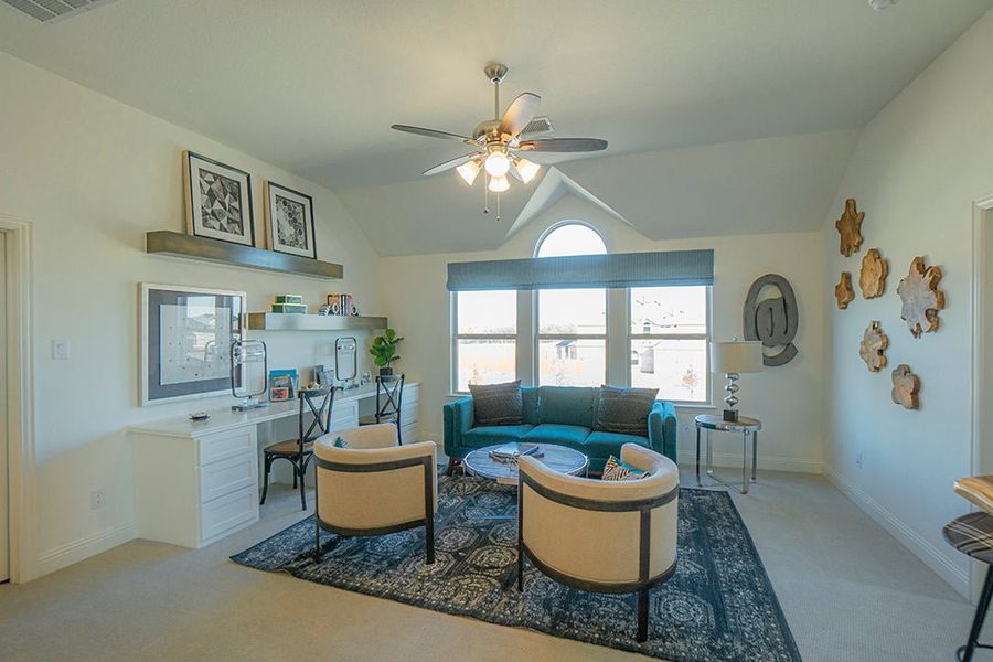Furnished interior in a model home at Woodcreek in Fate (Image 27).