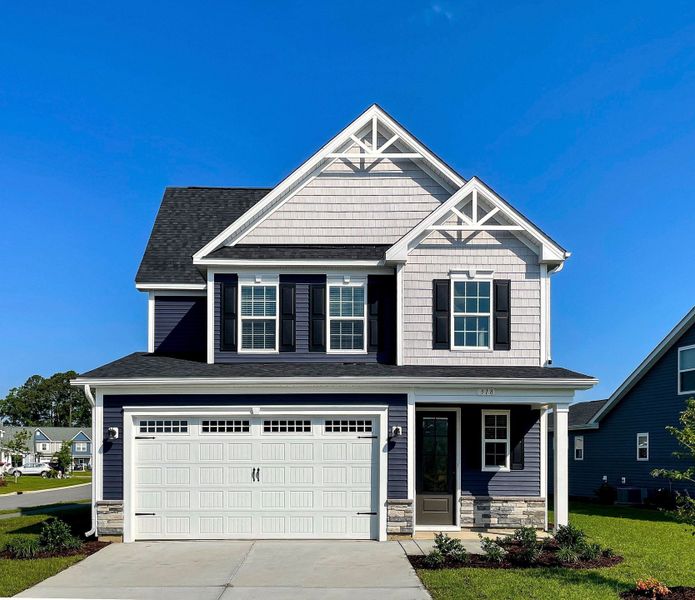 Front exterior of a home in the Highgate community, located in Clayton, NC (Image 5). Front exterior of a home in the Highgate community, located in Clayton, NC (Image 5).