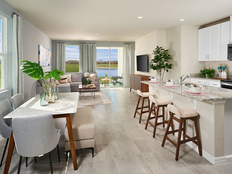 The Yellowstone dining and kitchen modeled at Magnolia Bay.