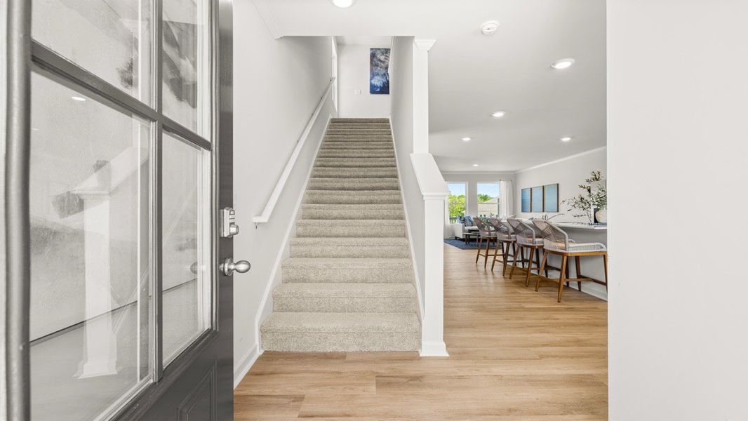 Furnished interior in a model home at Waypoint in Flowery Branch (Image 6).