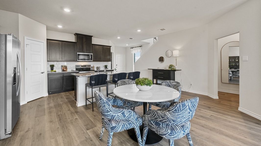 Furnished interior in a model home at The Villages of Hurricane Creek Townhomes in Anna (Image 25). Furnished interior in a model home at The Villages of Hurricane Creek Townhomes in Anna (Image 25).
