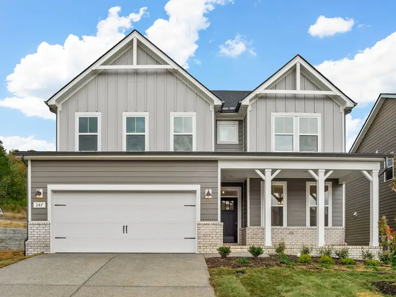 Front exterior of a home in the Woods Crossing community, located in Gallatin, TN (Image 2).