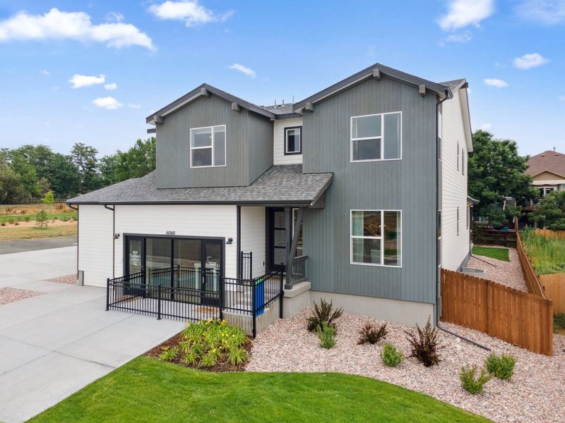 Front exterior of a home in the Highlands Preserve community, located in Mead, CO (Image 2).