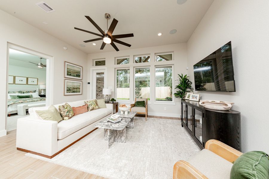 Furnished interior in a model home at Madeley Creek: Premier Collection in Conroe (Image 9).