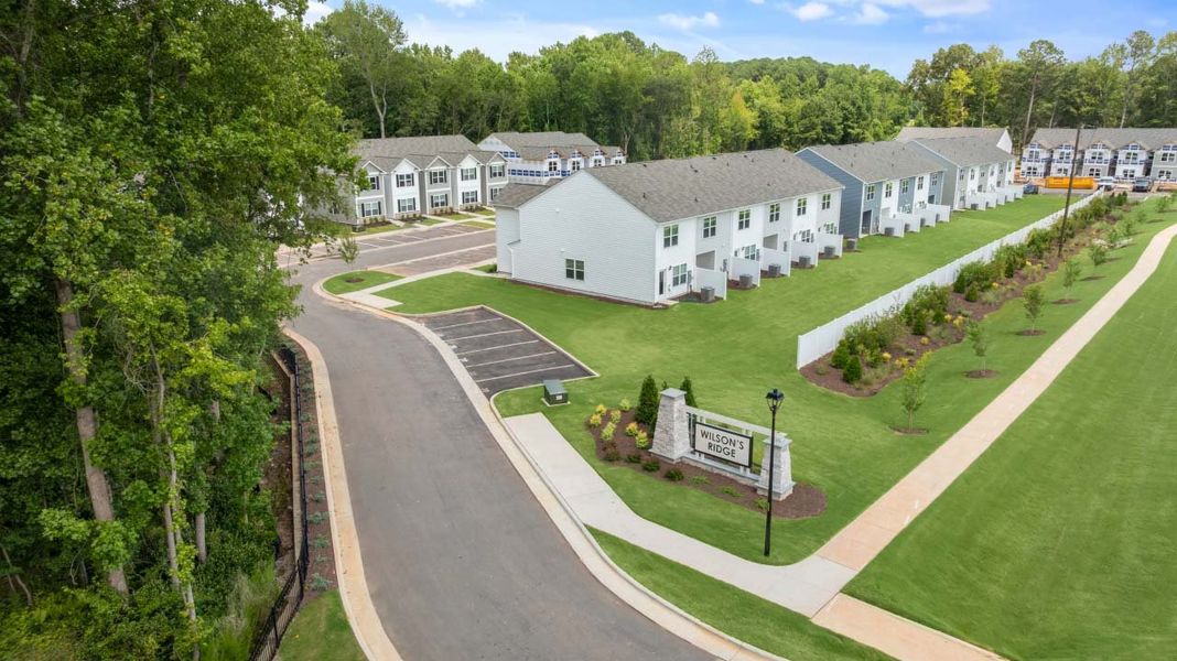 Front exterior of a home in the The Townes at Wilson's Ridge community, located in Wilson's Mills, NC (Image 17).