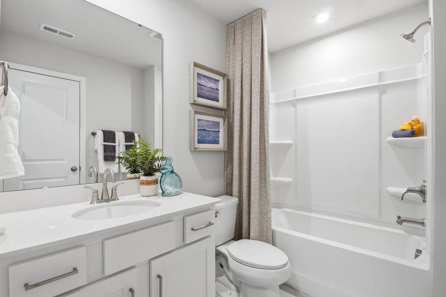 Furnished interior in a model home at Clairmont in Charlotte (Image 25).