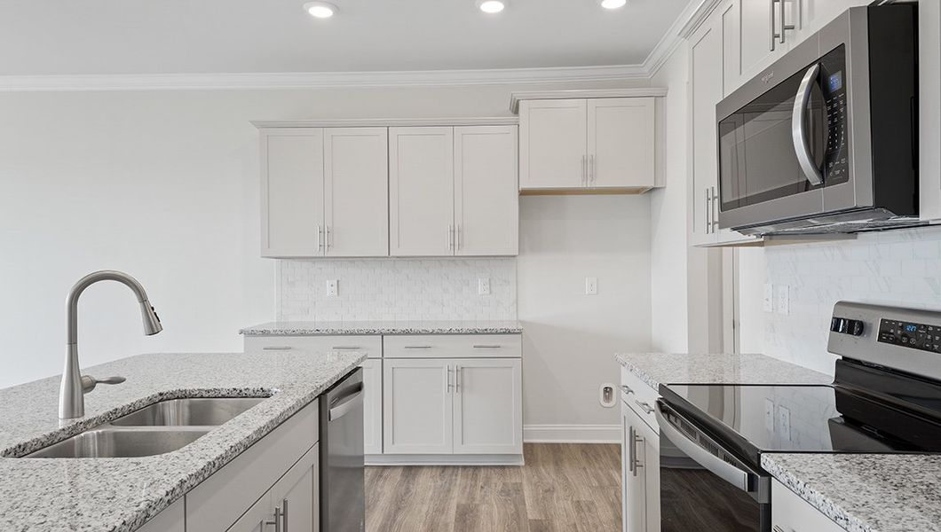 Furnished interior in a model home at Skybrook Corners in Concord (Image 7).