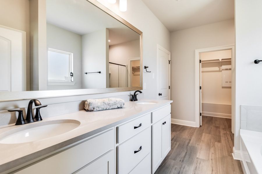 Furnished interior in a model home at Eagle Pointe in Pensacola (Image 9).