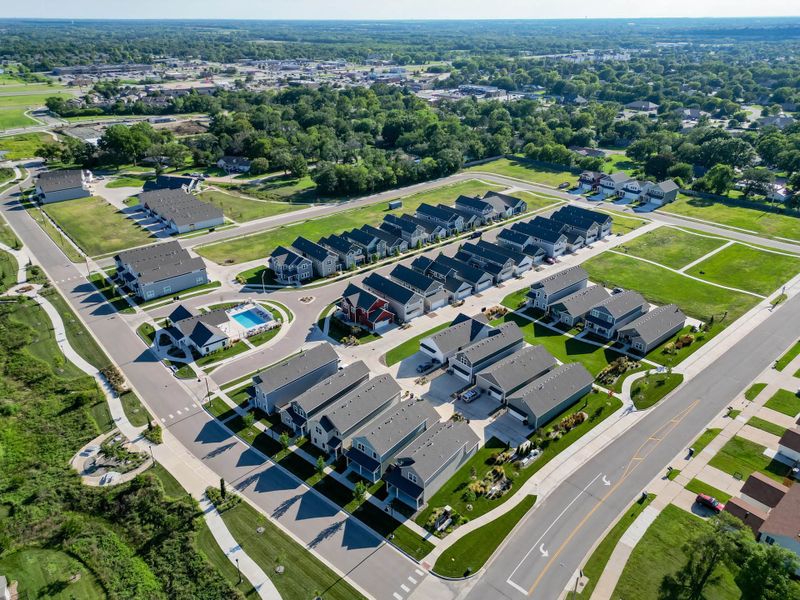 Aerial view of the Heritage Commons community in Andover, KS, showing layout and nearby surroundings (Image 13). Aerial view of the Heritage Commons community in Andover, KS, showing layout and nearby surroundings (Image 13).