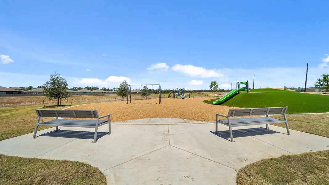 Front exterior of a home in the Grand Pines community, located in Magnolia, TX (Image 11).