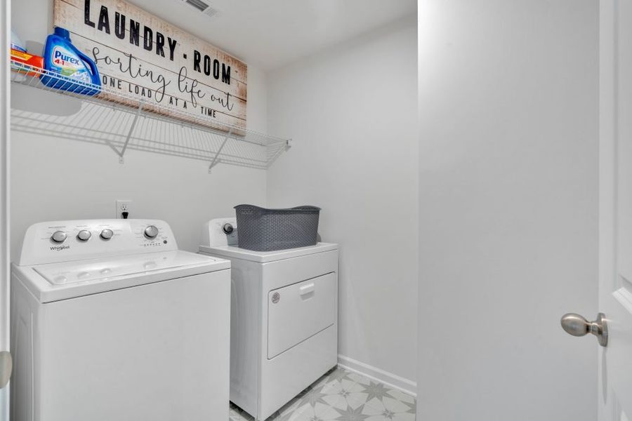 Furnished interior in a model home at Meadow Pines in Dallas (Image 9).