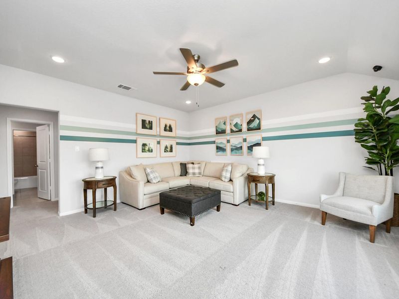 Furnished interior in a model home at Sunterra in Katy (Image 30).