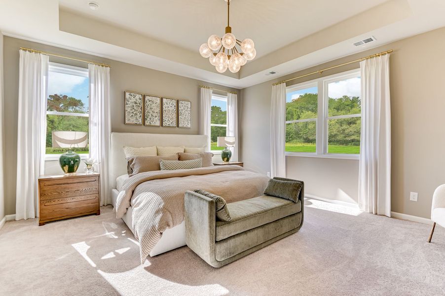 Spacious primary bedrooms to relax and unwind