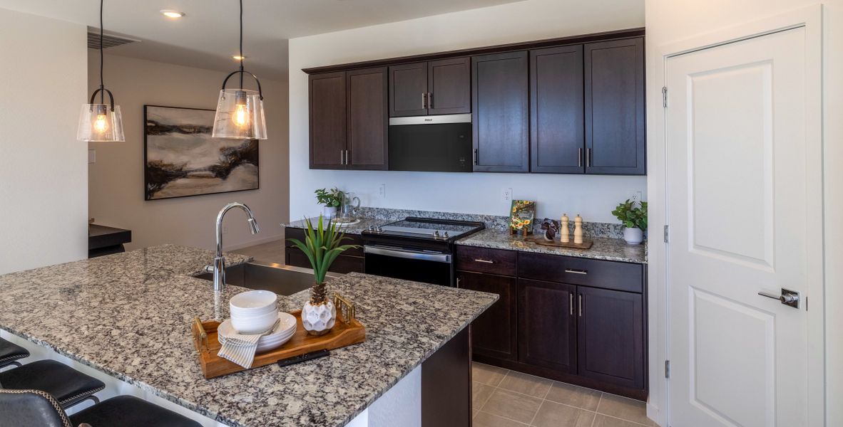 Furnished interior in a model home at Mountain View Estates Reserve Series in Buckeye (Image 3).