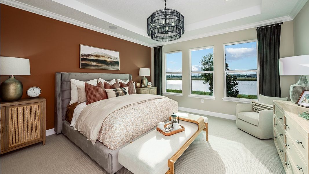 Furnished interior in a model home at Ardisia Park in New Smyrna Beach (Image 7).