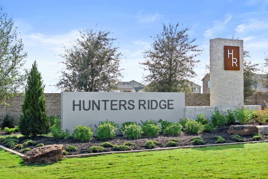 Entrance to the Hunters Ridge community in Crowley, TX, featuring signage and landscaping (Image 2).
