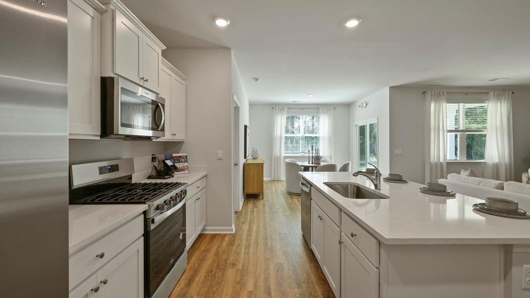 Furnished interior in a model home at Pineview North in Summerville (Image 7).