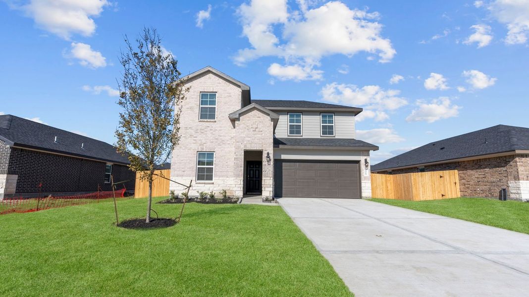 Front exterior of a home in the Caldwell Crossing community, located in Iowa Colony, TX (Image 9). Front exterior of a home in the Caldwell Crossing community, located in Iowa Colony, TX (Image 9).