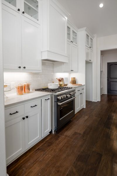 Furnished interior in a model home at Greens Prairie Reserve in College Station (Image 27).