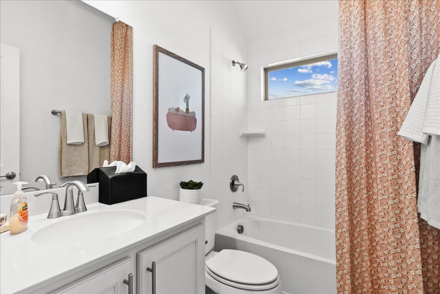 Furnished interior in a model home at Creekview Meadows in Pilot Point (Image 28).