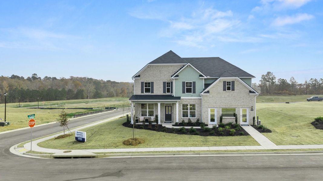 Front exterior of a home in the Evergreen Crossing community, located in Locust Grove, GA (Image 2).